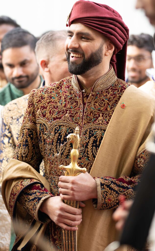 Groom in golden sherwaani