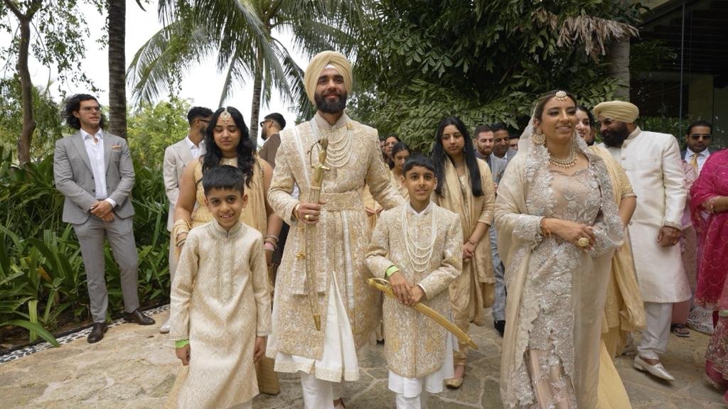 Matching sherwanis for groom, kids, boys and family at UK wedding