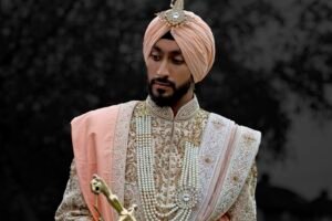 sikh groom wearing turban with kalgi